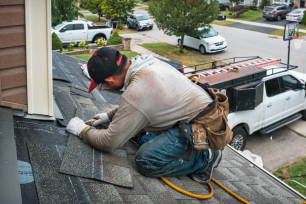 Professional Roofing technician working in North East, PA